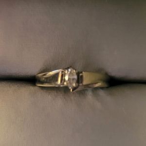 10k white gold ring with Marquise shaped diamond
